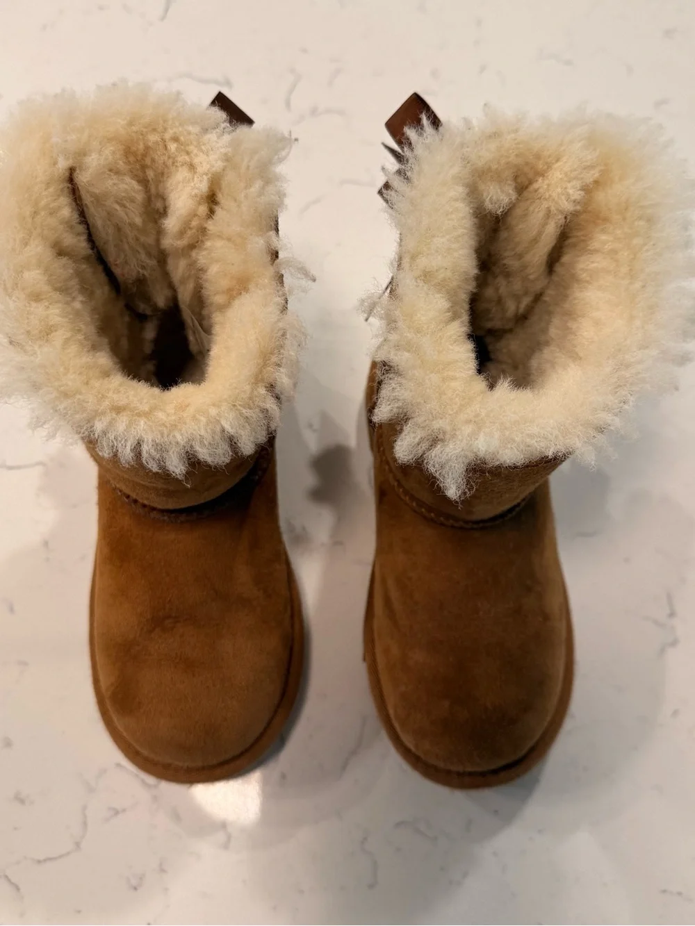 UGG Kids Cozy Faux-Shearling Brown Boots with Bows